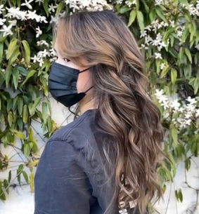 Rich chocolate brunette with long waves